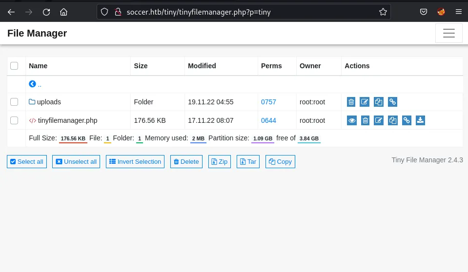 Contents of the file folder showing tinyfilemanager.php and the uploads folder.